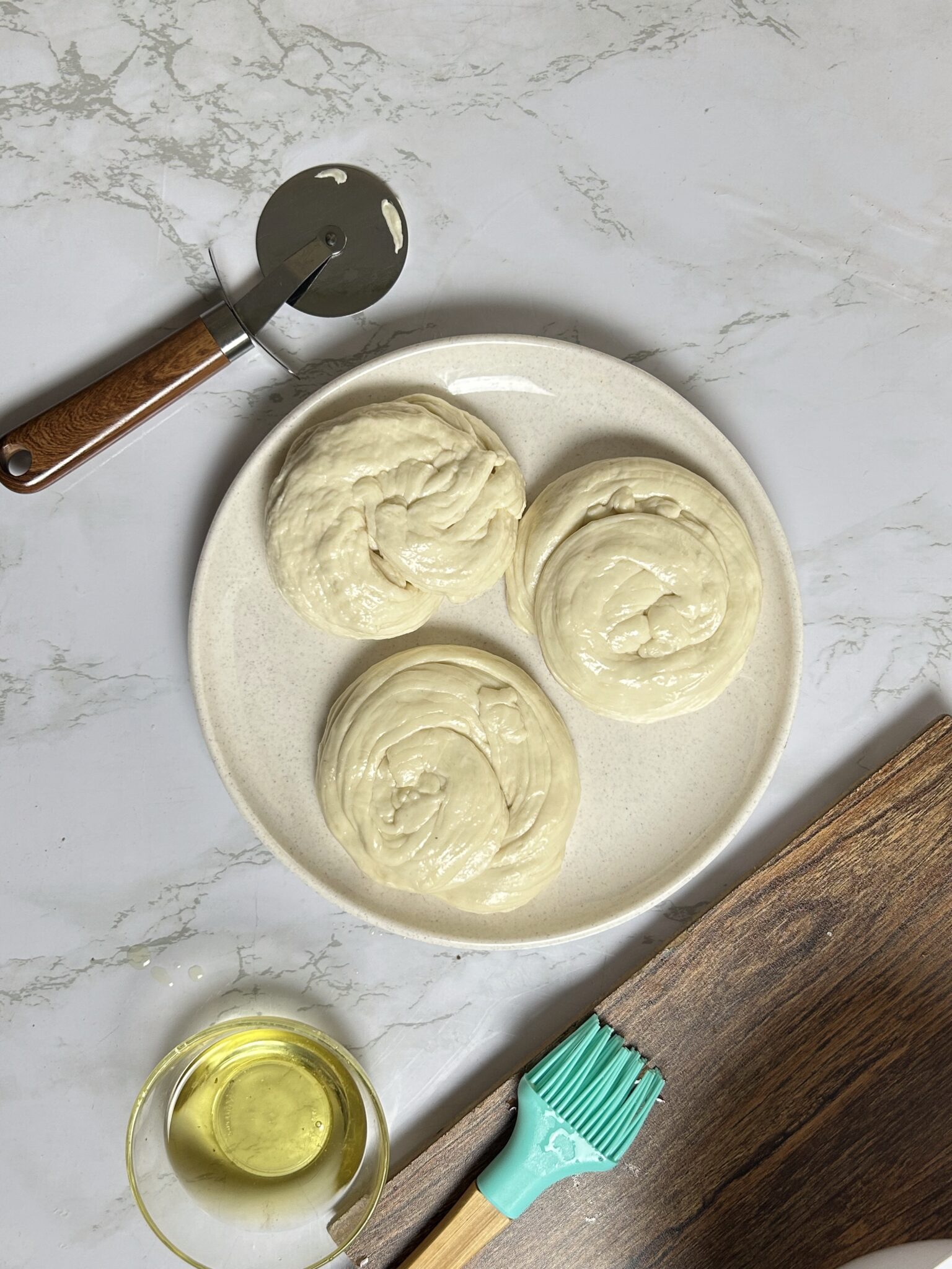adding cheese to burger patties