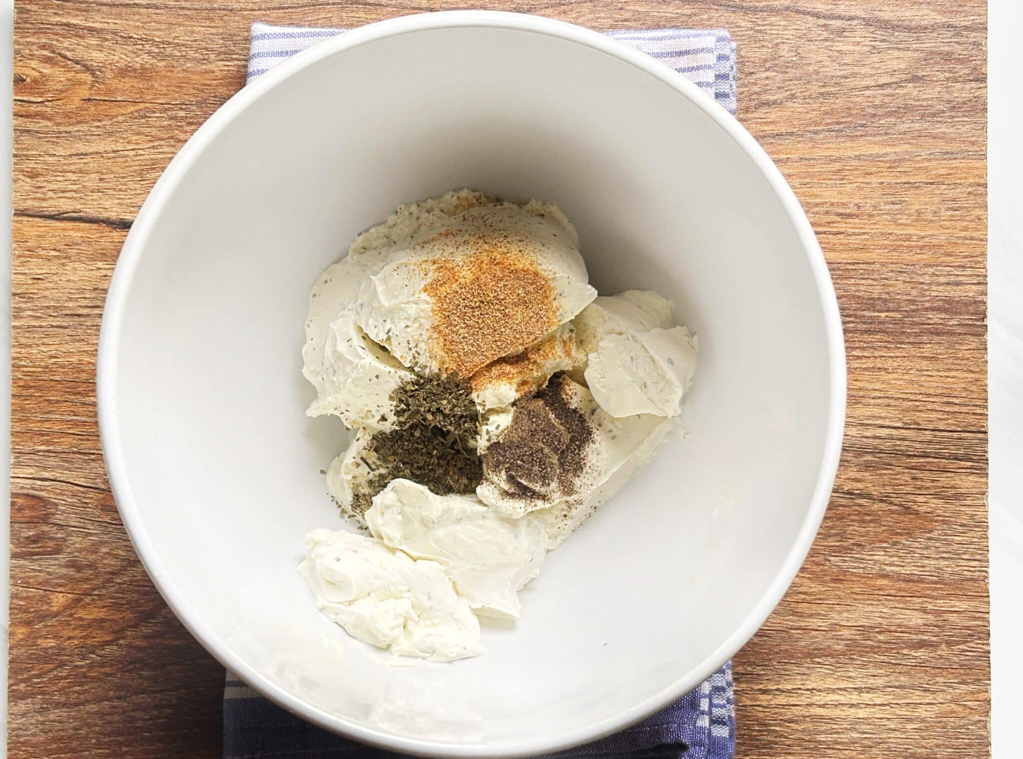Cream cheese mixed with garlic, pepper, salt, and parsley Cream cheese mixed with garlic, pepper, salt, and parsley