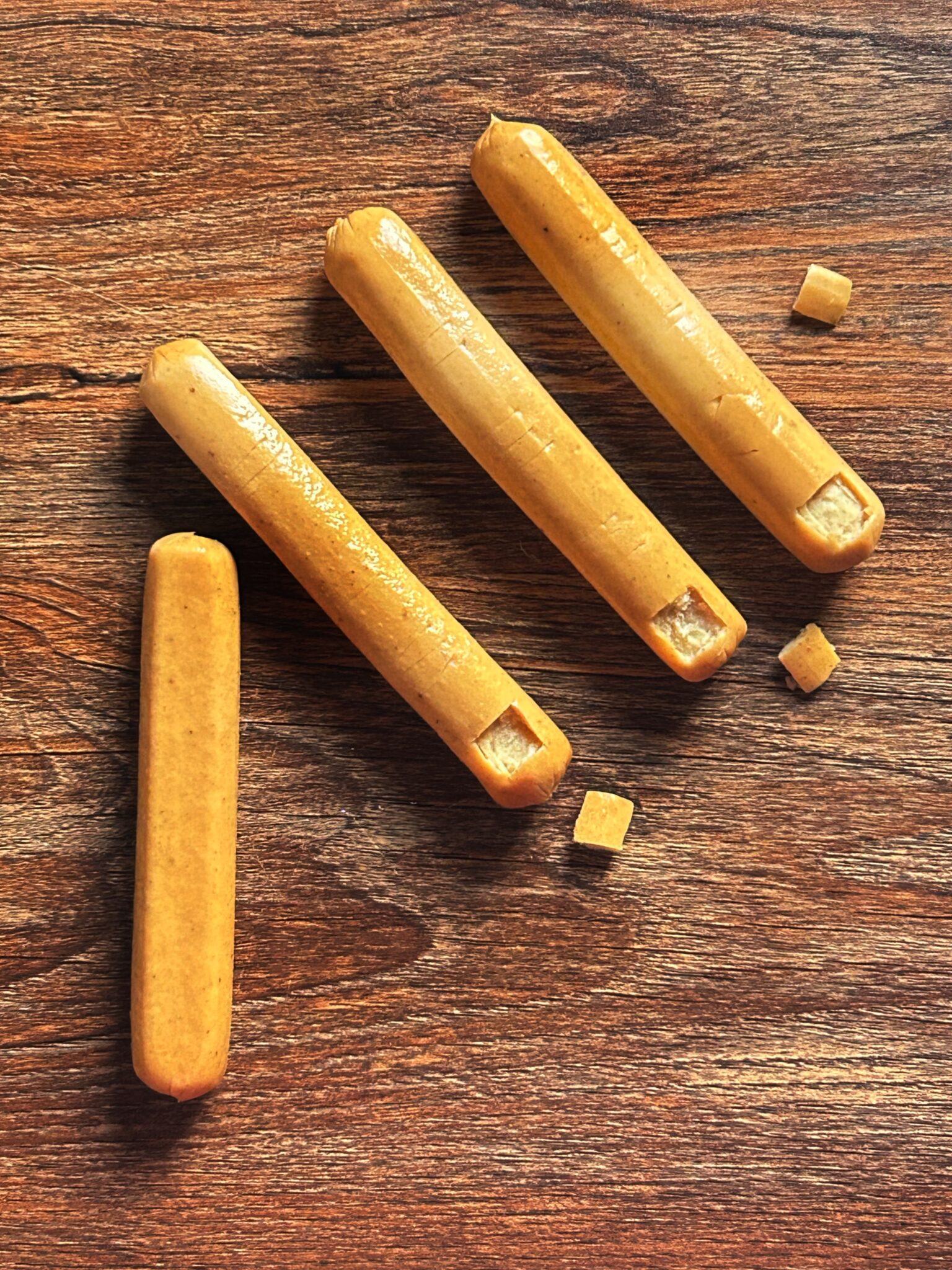 Hot dog with nail-shaped tip carved and skin peeled to resemble a finger Hot dog with nail-shaped tip carved and skin peeled to resemble a finger