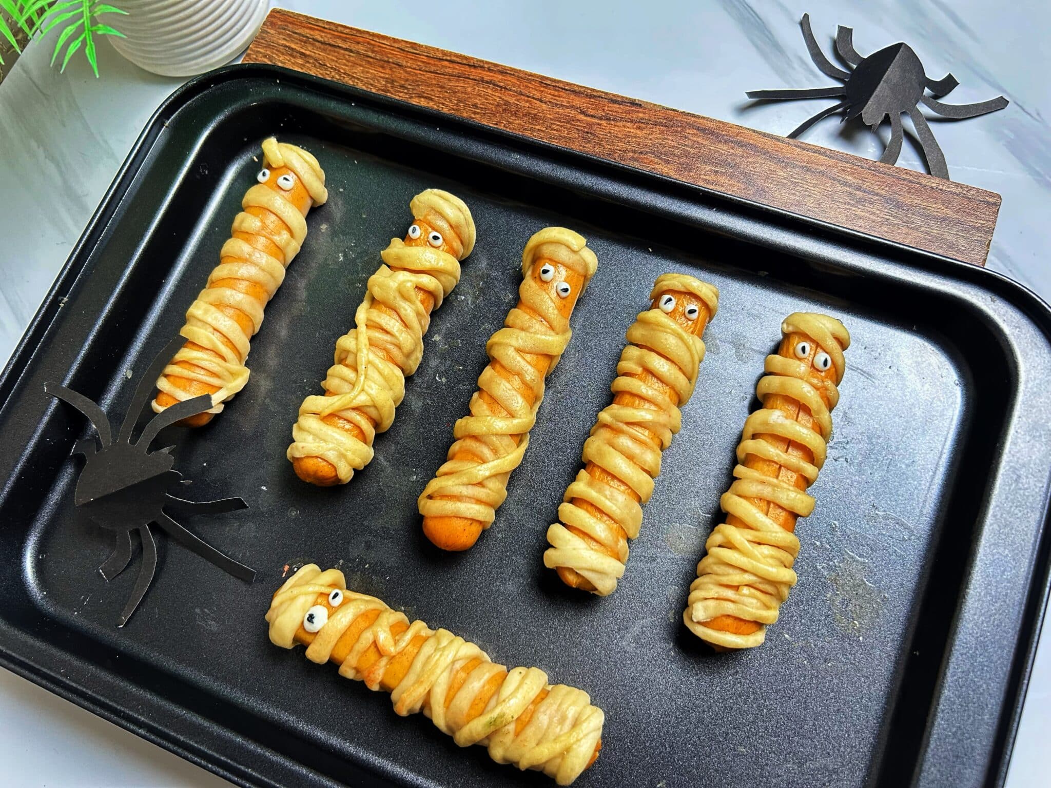 hot dogs ready to be baked