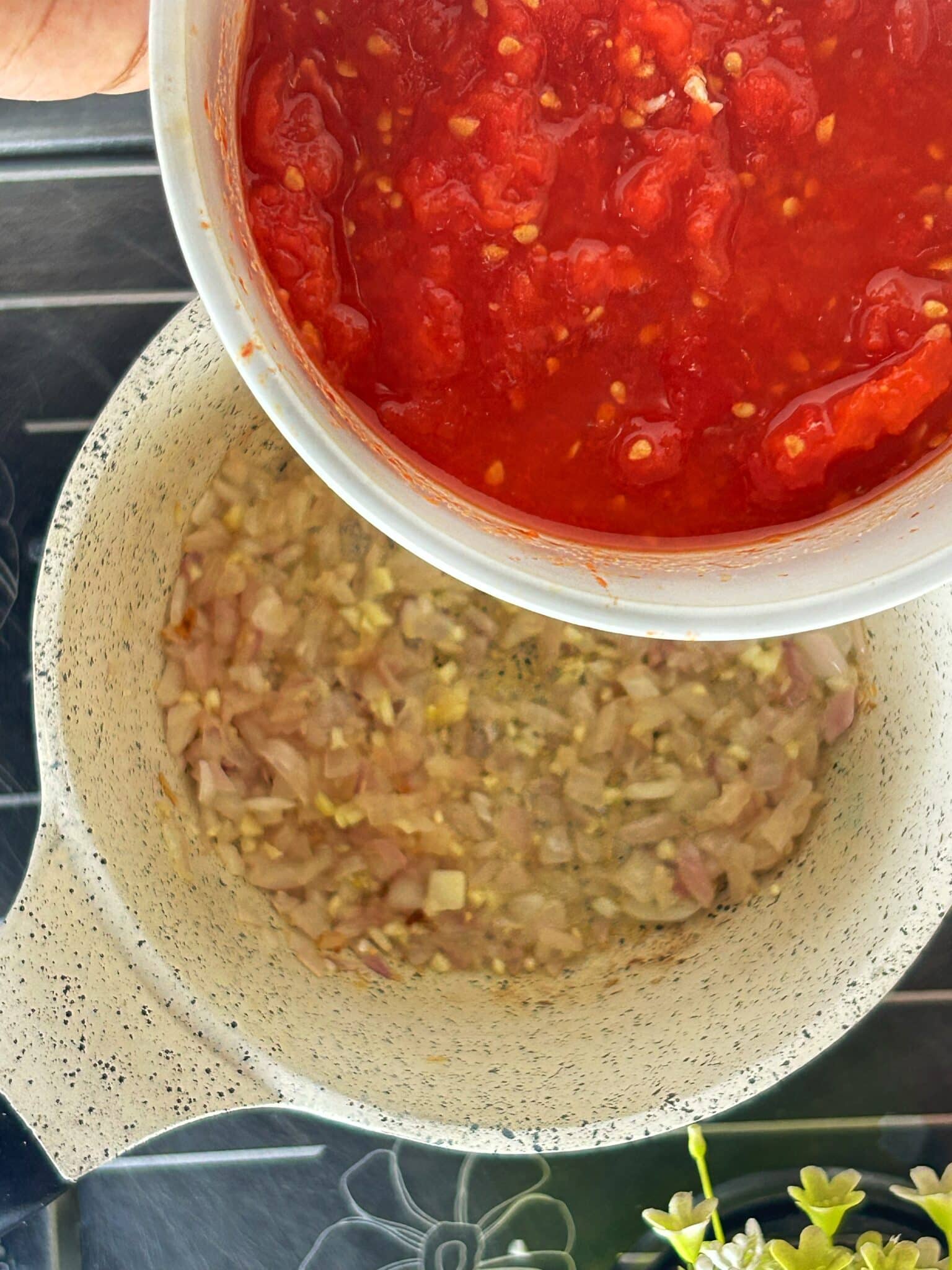 adding tomatoes to onions adding tomatoes to onions