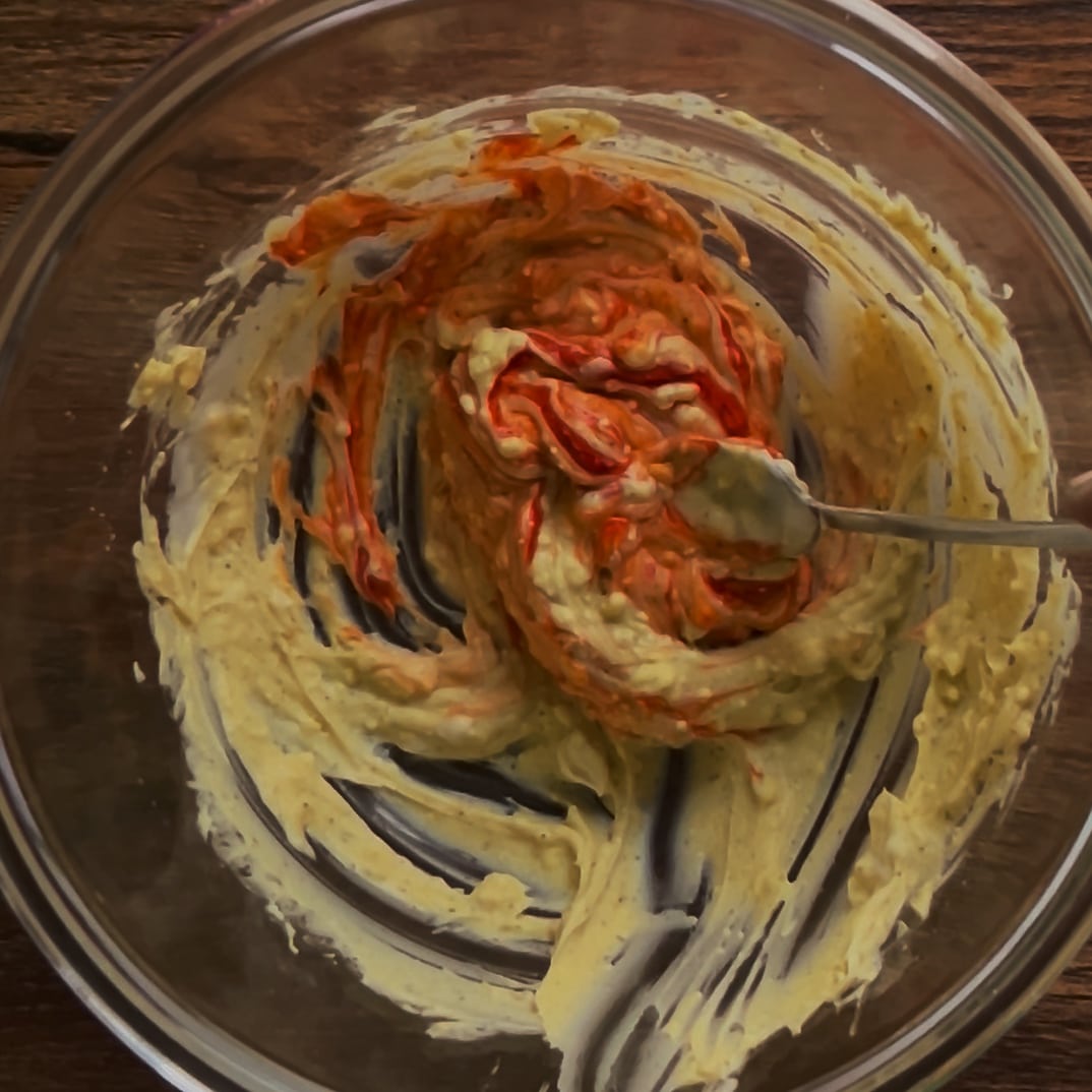 Mashed yolks mixed with mayo, mustard, salt, and pepper Mashed yolks mixed with mayo, mustard, salt, and pepper