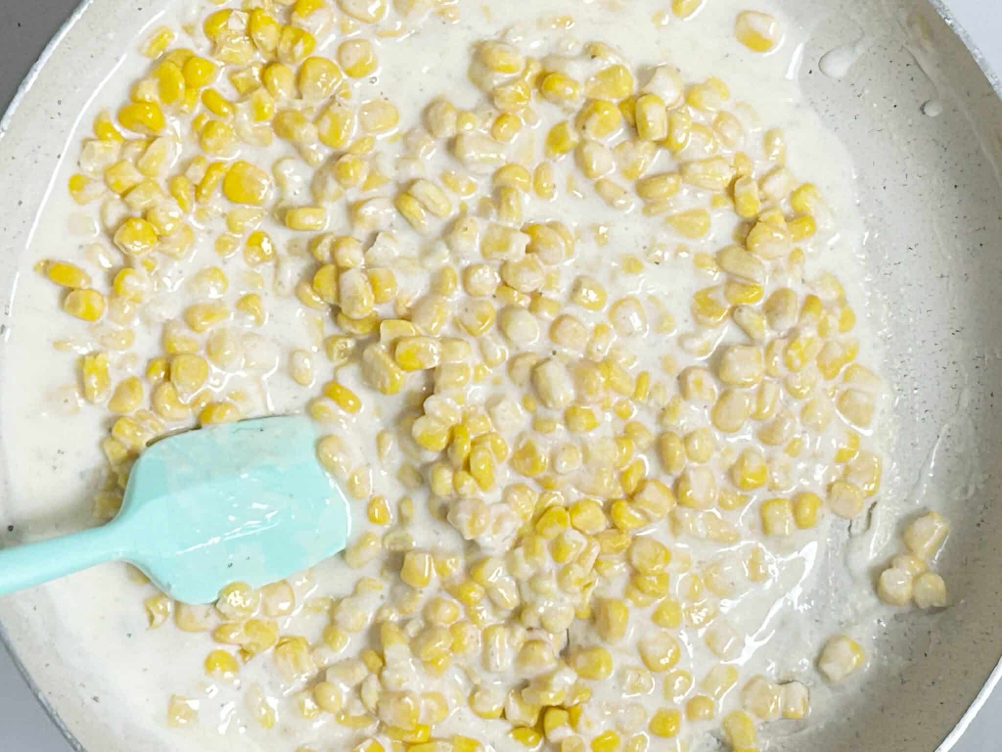 Corn mixed into white sauce Corn mixed into white sauce