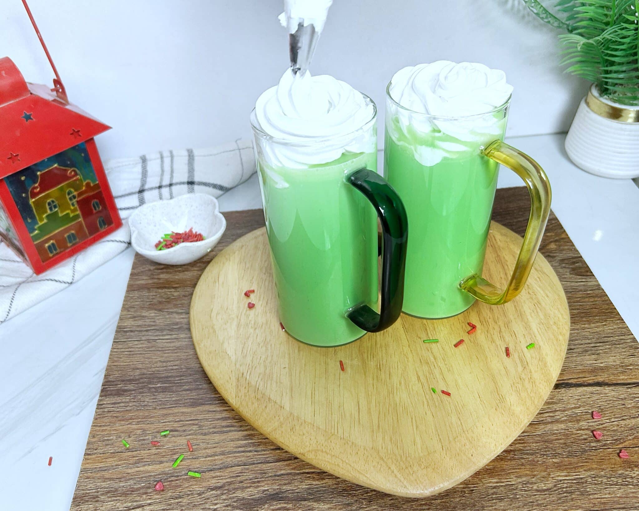 adding whipping cream to the grinch hot chocolate adding whipping cream to the grinch hot chocolate