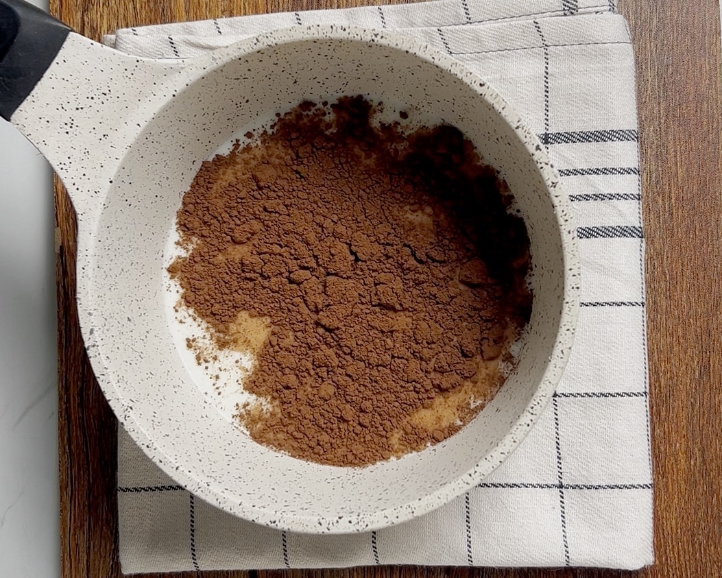 Small/medium pot, heat milk, add sugar and cocoa powder, start whisking until smoothly combined Small/medium pot, heat milk, add sugar and cocoa powder, start whisking until smoothly combined