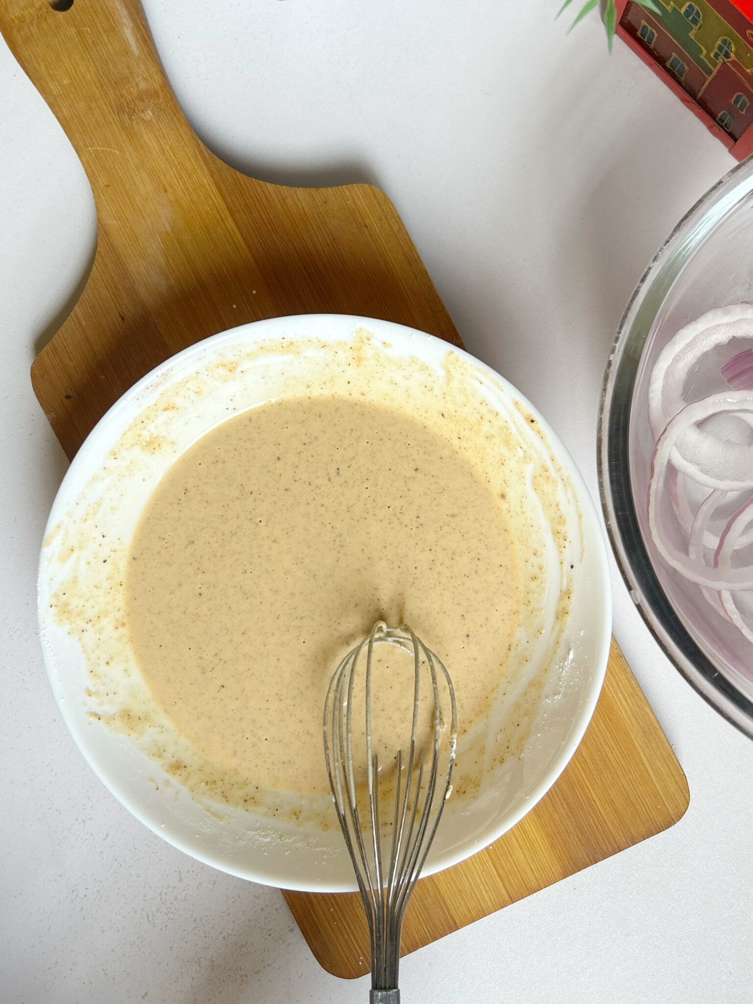 Whisking batter mixture Whisking batter mixture