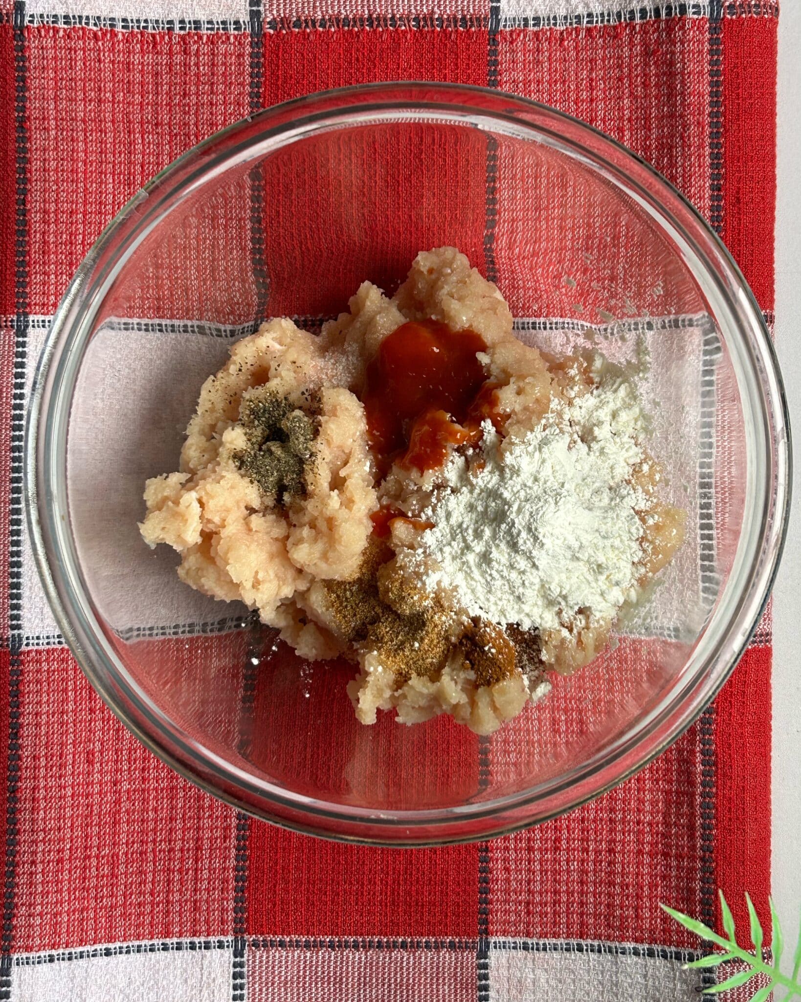 Seasoning ground chicken with spices for homemade crispy Chicken McNuggets Seasoning ground chicken with spices for homemade crispy Chicken McNuggets