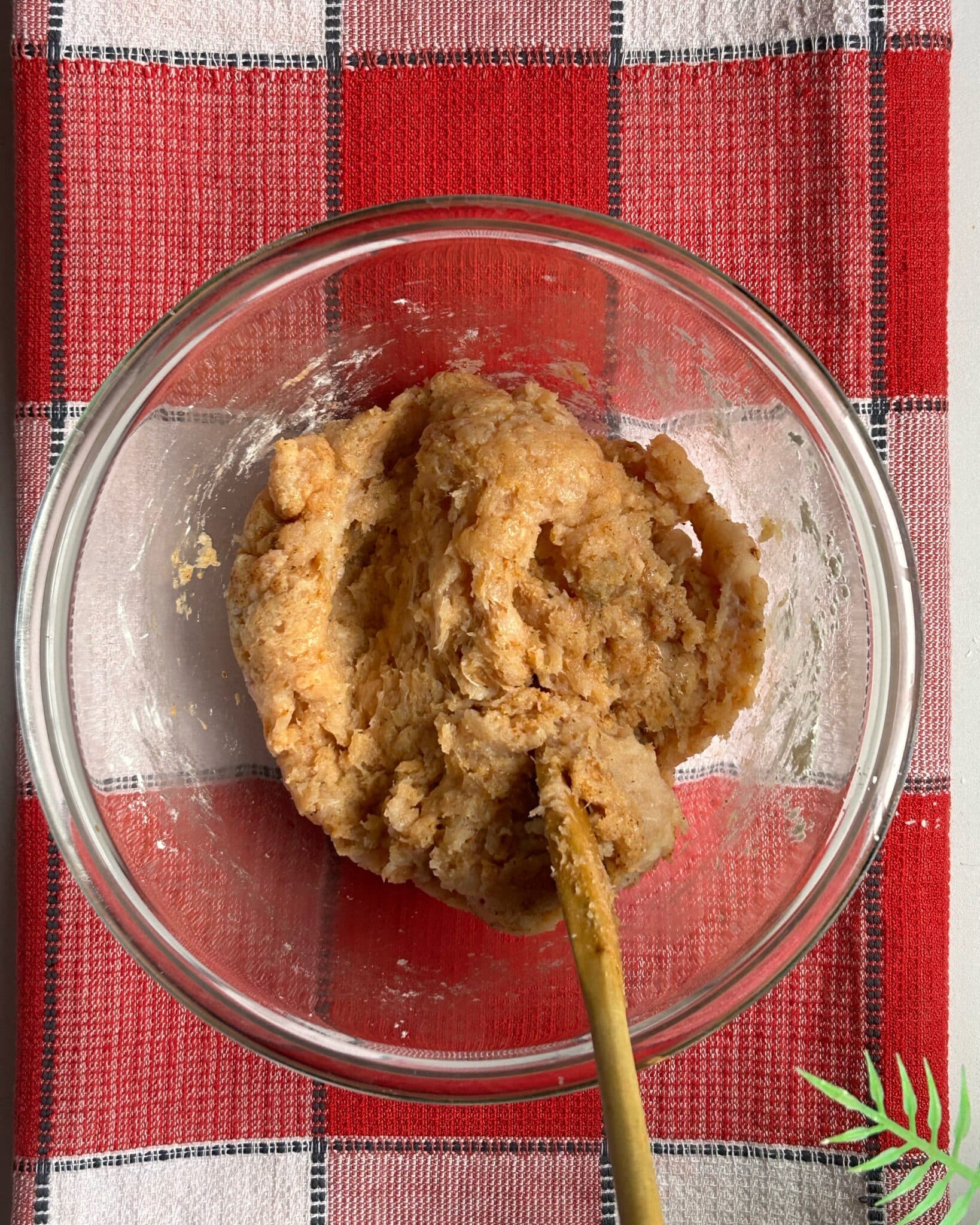Combining ground chicken and spices to prepare homemade chicken nuggets mixture Combining ground chicken and spices to prepare homemade chicken nuggets mixture