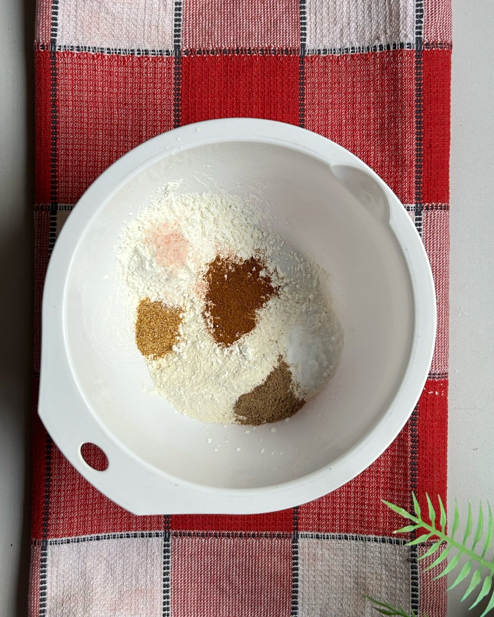 Preparing seasoned flour coating mixture for homemade crispy Chicken McNuggets Preparing seasoned flour coating mixture for homemade crispy Chicken McNuggets