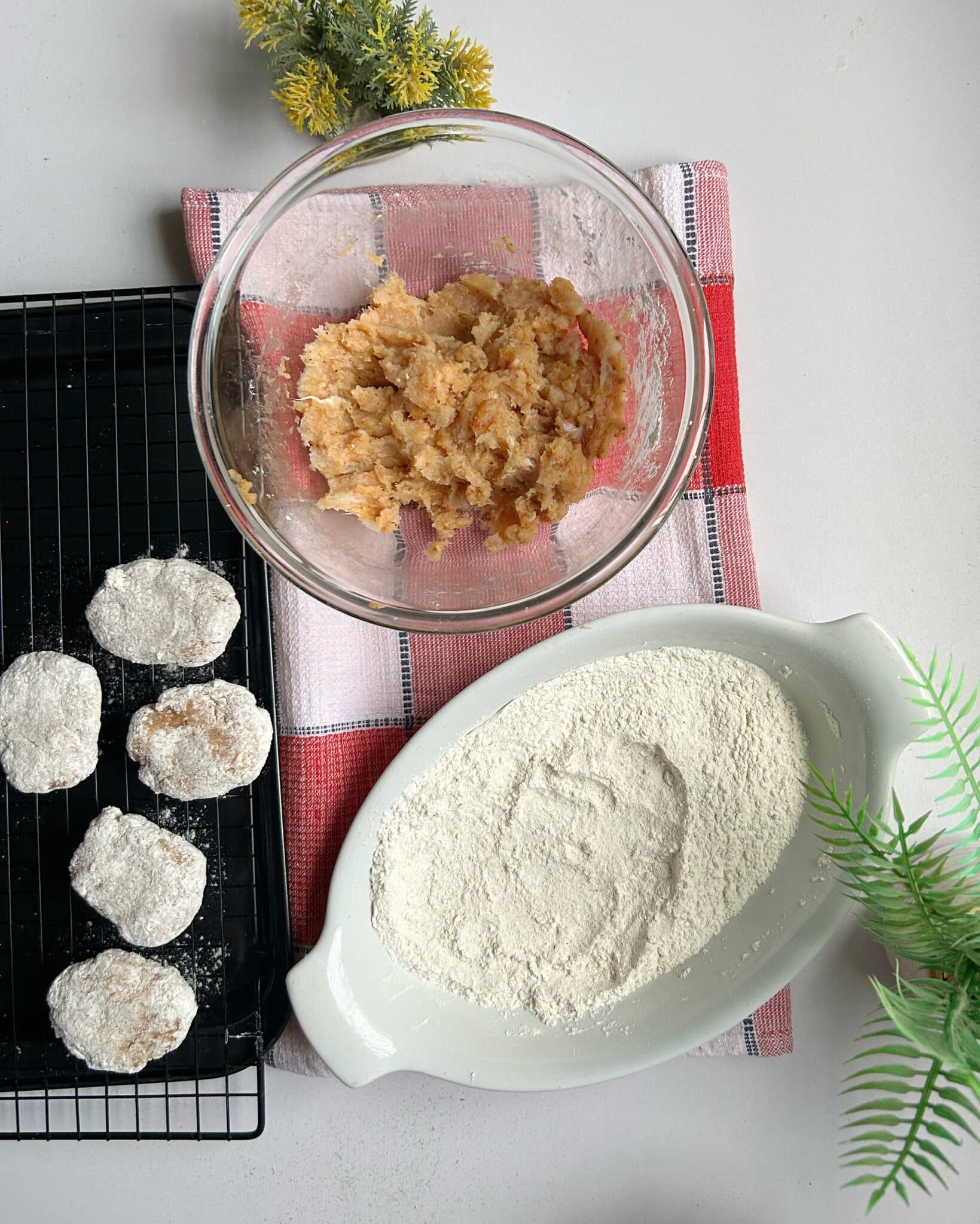 Shaping seasoned ground chicken mixture into homemade Chicken McNuggets before coating Shaping seasoned ground chicken mixture into homemade Chicken McNuggets before coating