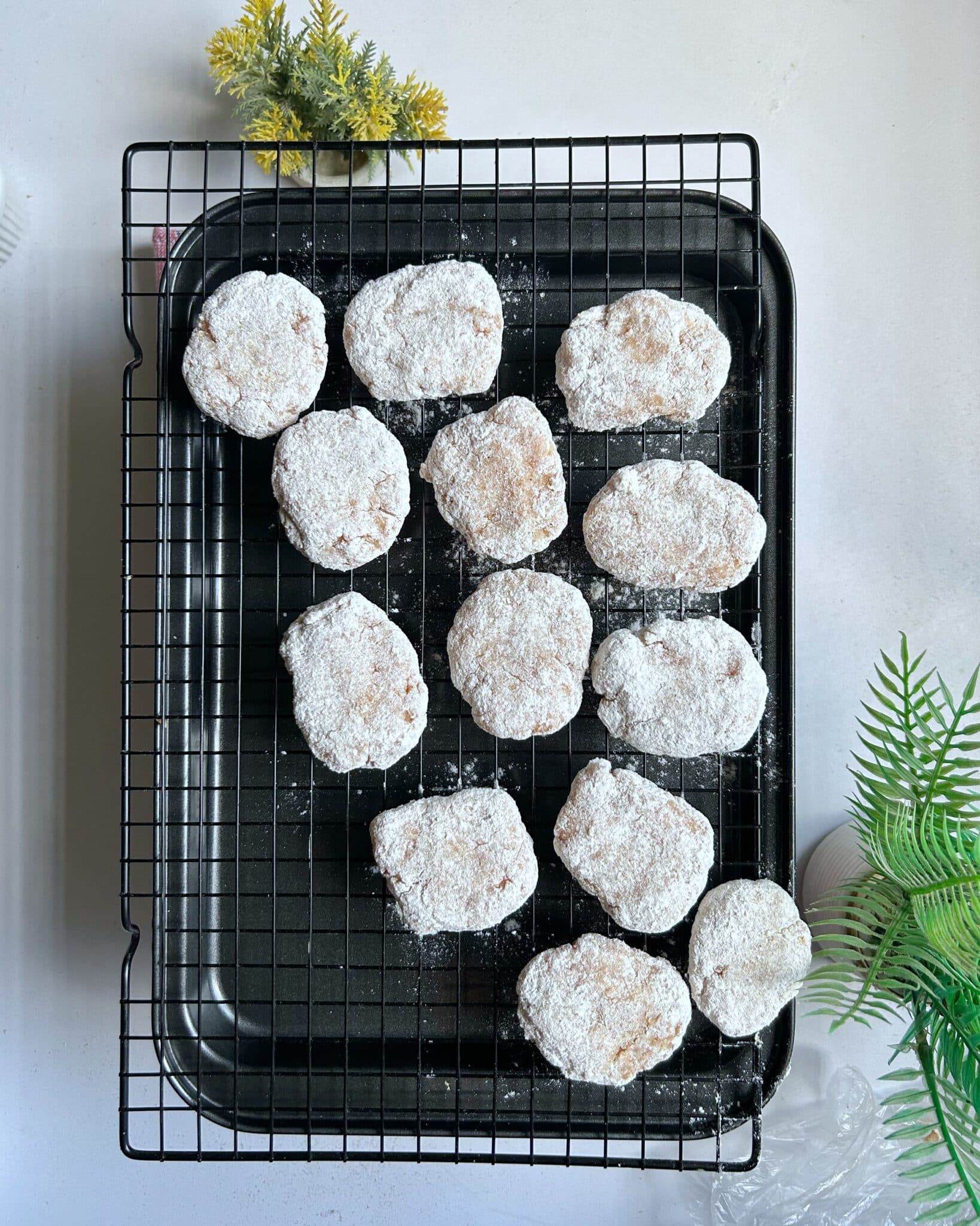 Coating homemade Chicken McNuggets in seasoned dry batter before frying Coating homemade Chicken McNuggets in seasoned dry batter before frying