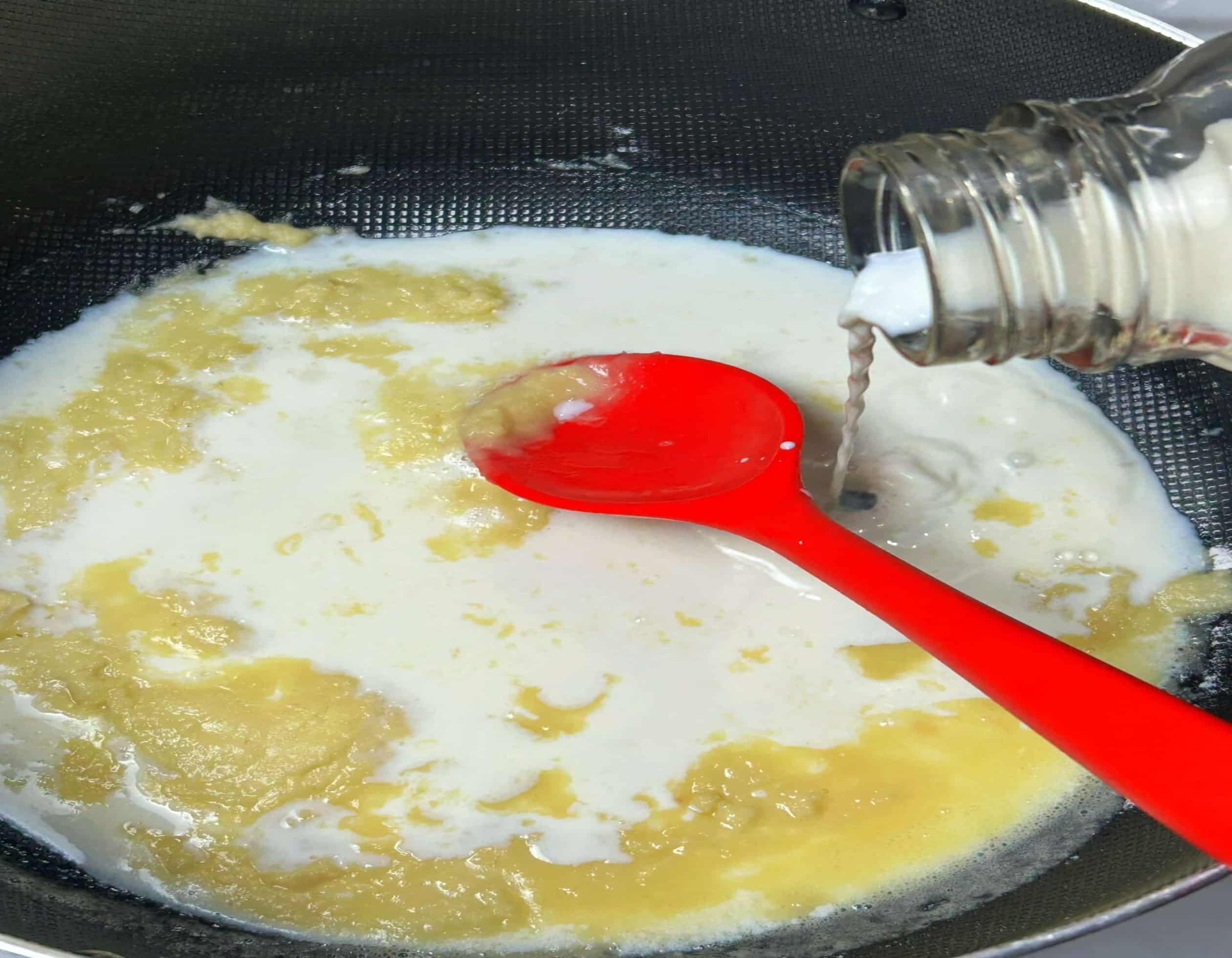 Melt the butter in a large pot and sprinkle in the flour.