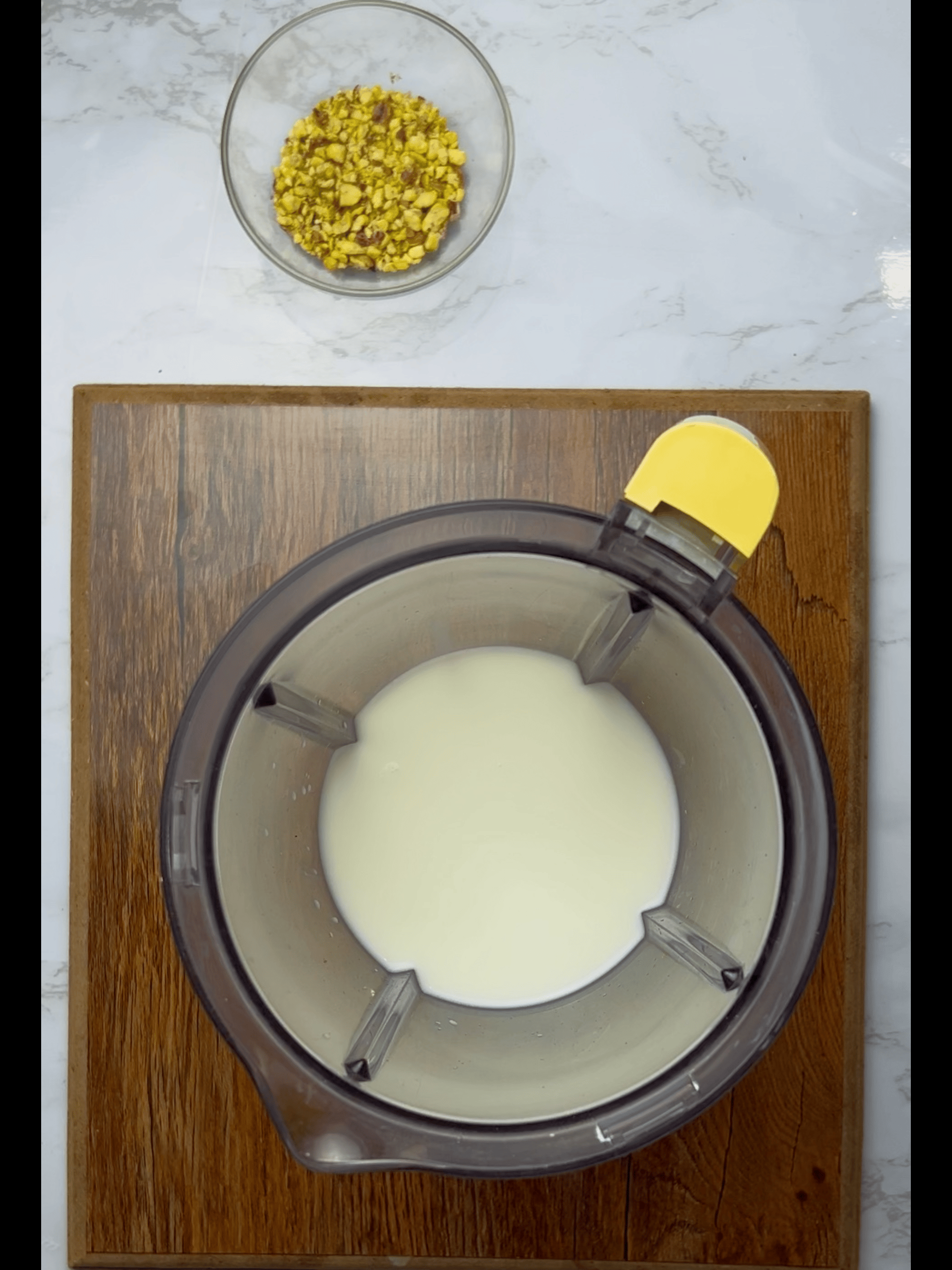 Add milk and sugar in the blender Add milk and sugar in the blender