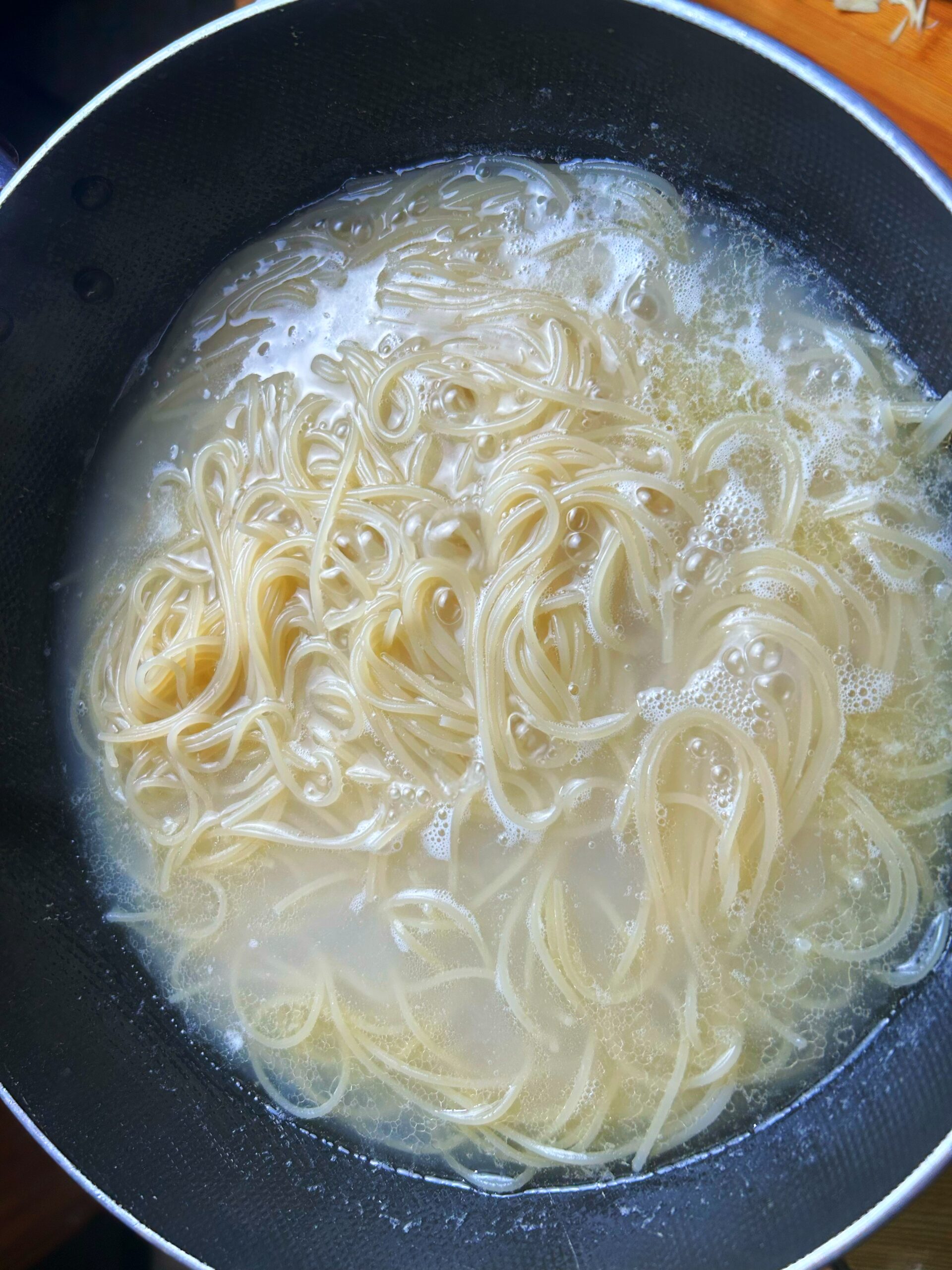 Cook spaghetti in the boiling water Cook spaghetti in the boiling water