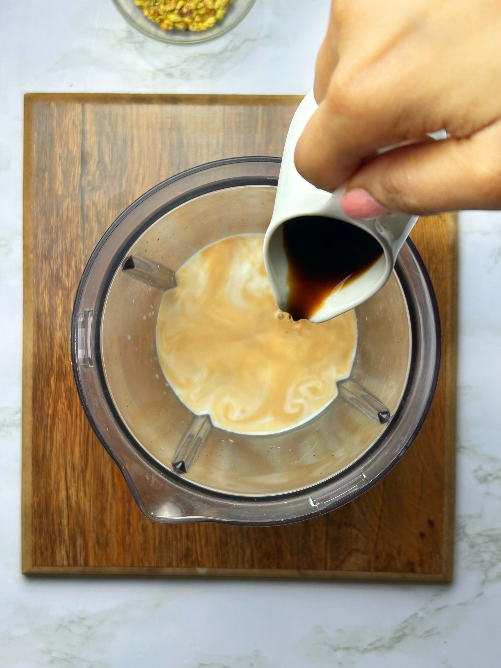 pouring coffee in the milk pouring coffee in the milk
