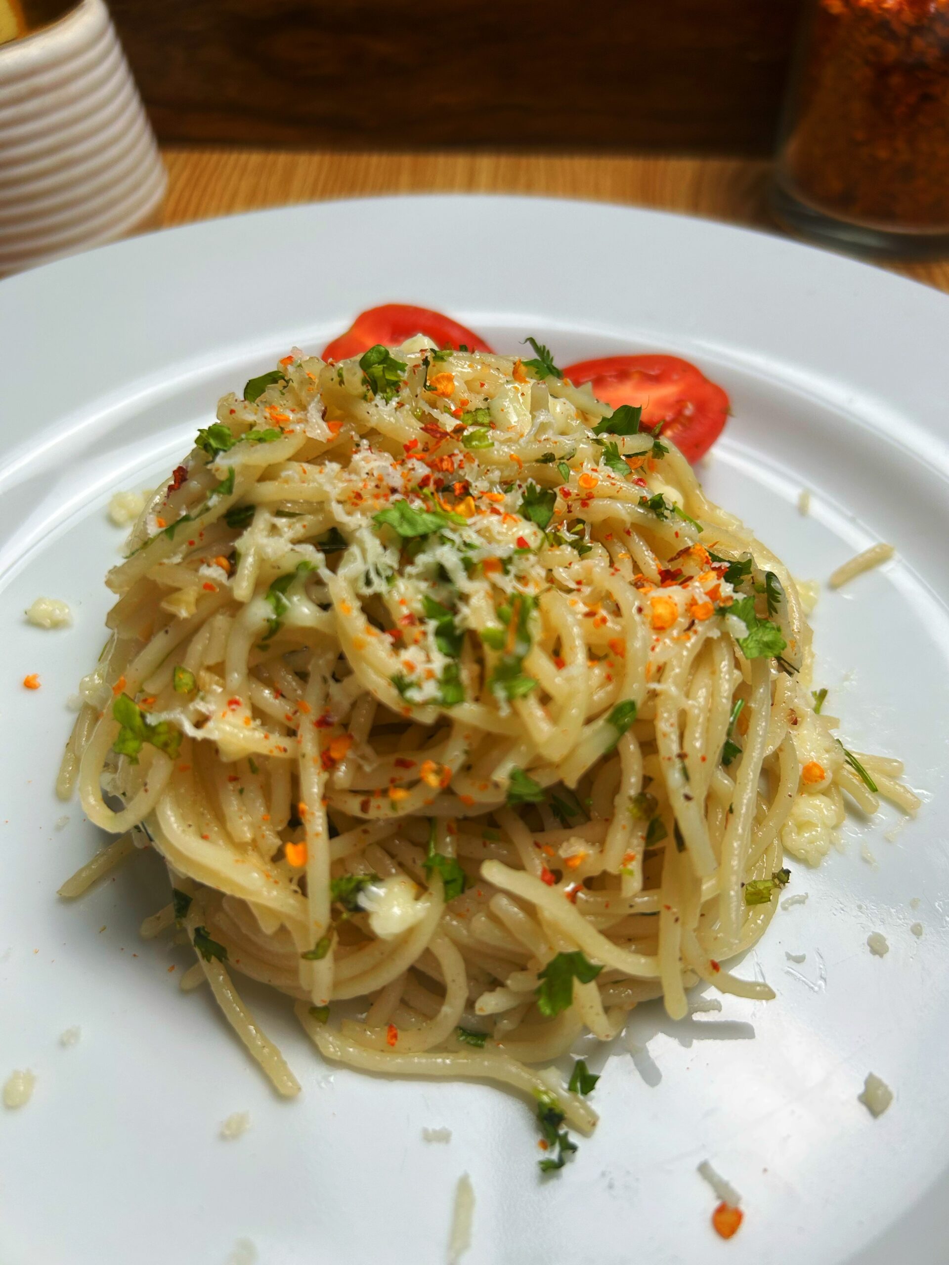 Serve pasta topped with Parmesan cheese Serve pasta topped with Parmesan cheese