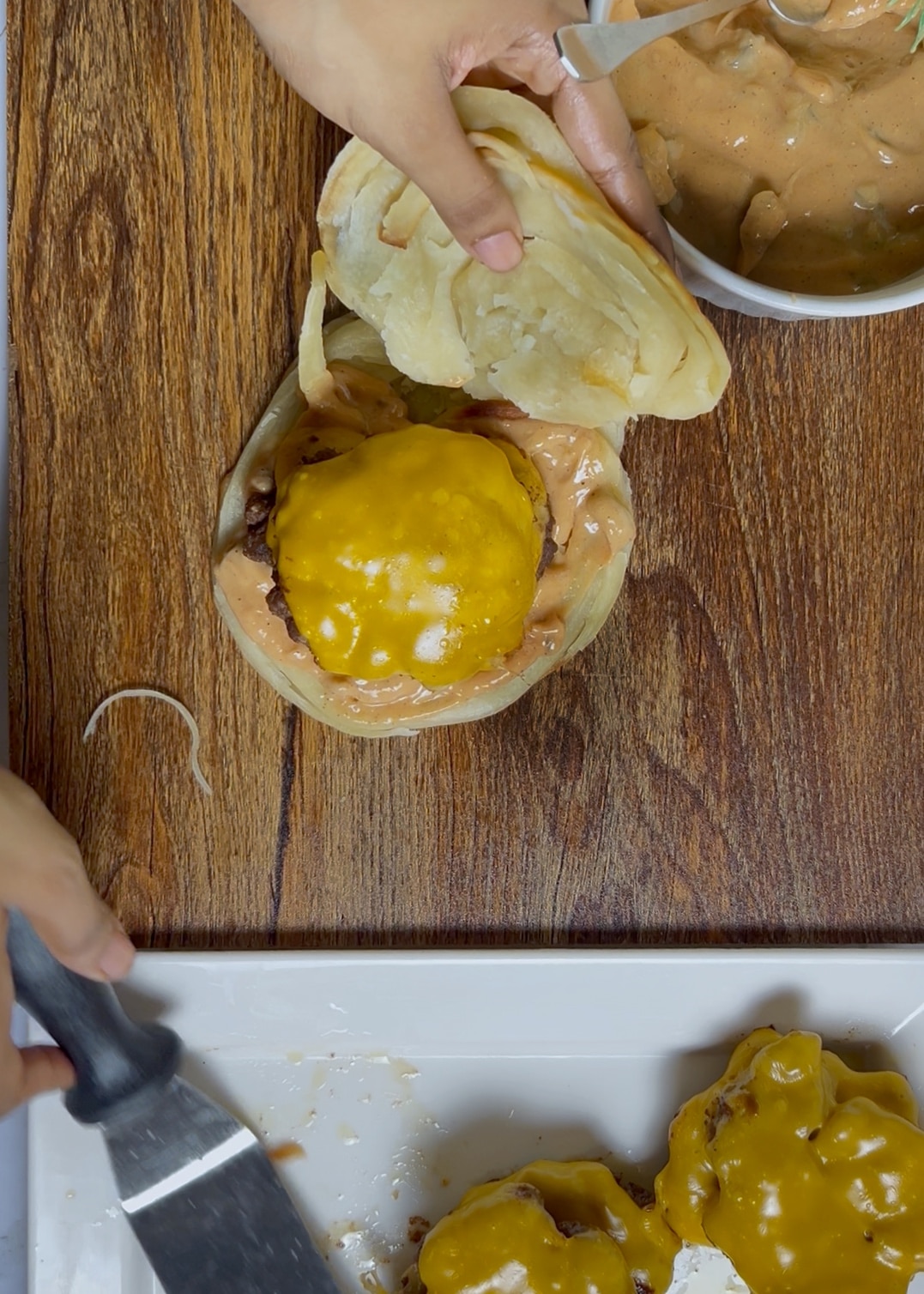 assembling the burger patties