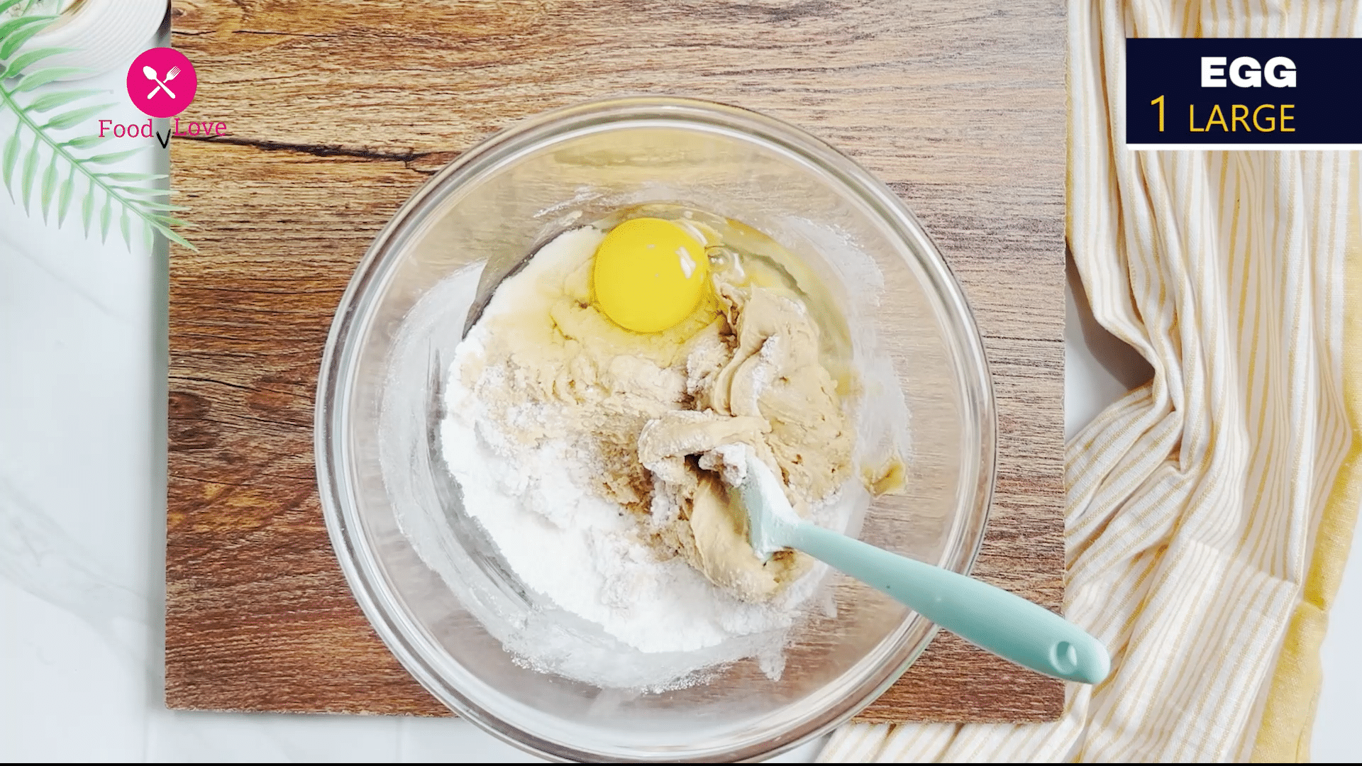 adding sugar and egg