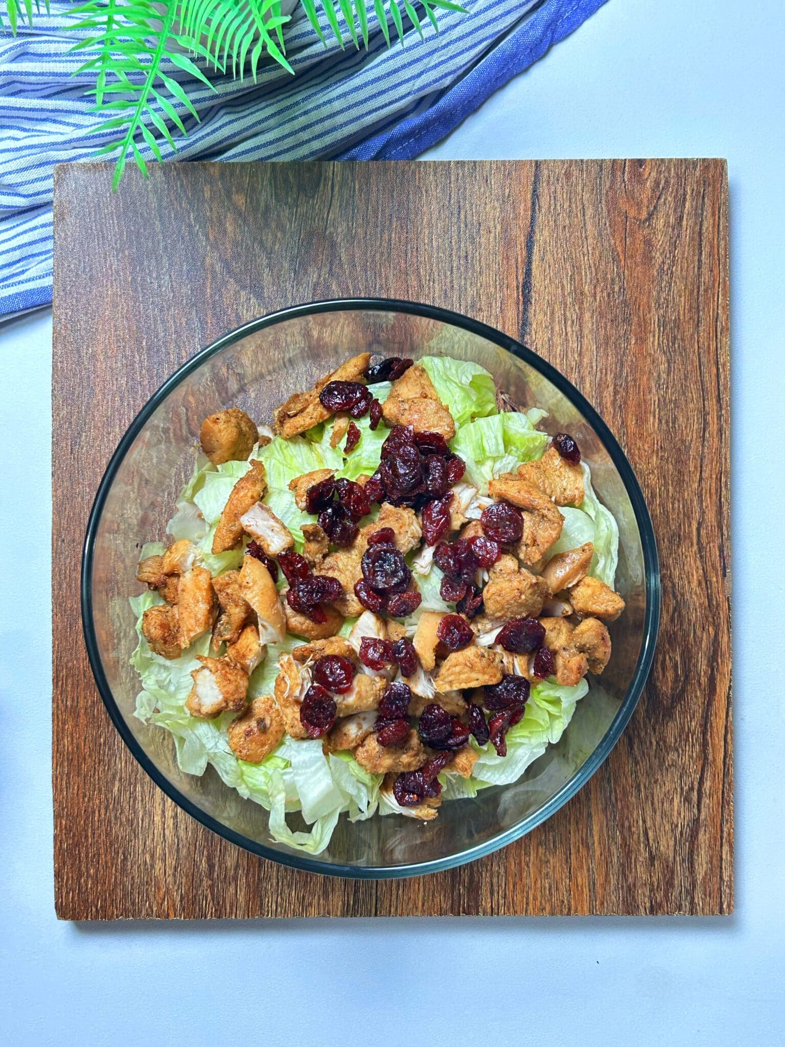 combining all the vegetables and chicken in a bowl
